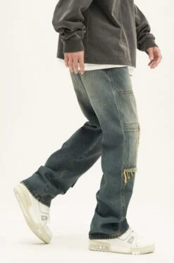 Distressed Patchwork Pocket Jeans -Modern Wear Shop 06bef9ea952ab88fe3d8fd397f95a349