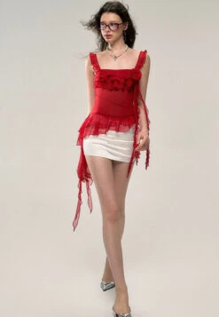 Asymmetric Hem Ruffled Sleeveless Top With Floral Accent -Modern Wear Shop 1bd0e55a68dcfcc4aca9b234674965e0