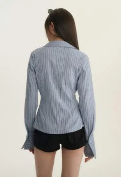 Button-Up Long Sleeve Blouse With Pocket -Modern Wear Shop 27e181c23b37f0448a8ab3d7bf841085