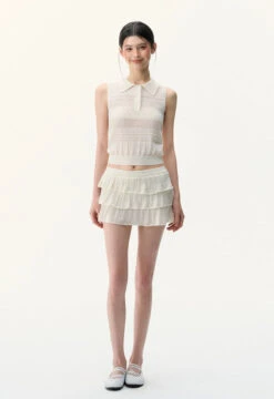 Sleeveless Knit Crop Polo Top And Tiered Mini Skirt Two-Piece Set -Modern Wear Shop 33b2ed013c3cb55833cd7aff334cb6d4