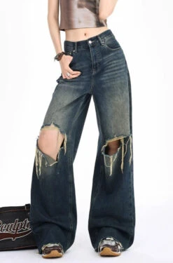 Distressed Wide-Leg Denim Jeans With Raw Hems -Modern Wear Shop 3a5d3544d7104d3089786940a0288b0d