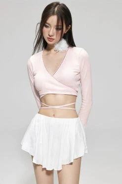 Wrap Long Sleeve Top And Skirted Bikini Set -Modern Wear Shop 3d59cc11109437164fc9d33163a7e4b8