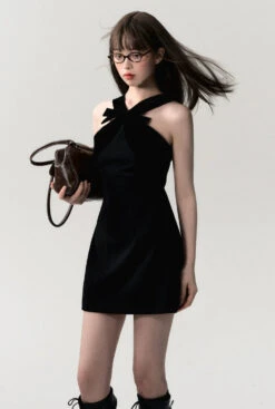 Sleeveless Mini Dress With Velvet Crisscross Neckline And Bow Detail -Modern Wear Shop 602374389965decc854afba345ebb420