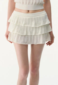 Sleeveless Knit Crop Polo Top And Tiered Mini Skirt Two-Piece Set -Modern Wear Shop 6f0a127d5fc97cd440379cd72224ff77