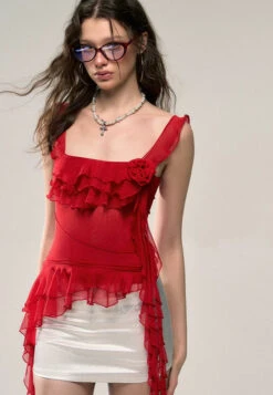 Asymmetric Hem Ruffled Sleeveless Top With Floral Accent -Modern Wear Shop 76e0bab9a4dcdcb9a0534d23e0d9e8c2