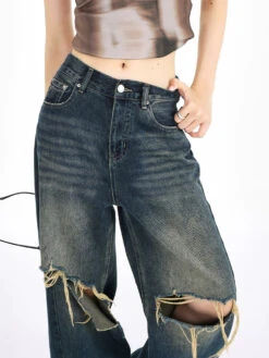 Distressed Wide-Leg Denim Jeans With Raw Hems -Modern Wear Shop 7be8e62c8f1728c242d1fc7ee933acf2