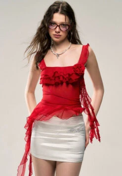 Asymmetric Hem Ruffled Sleeveless Top With Floral Accent -Modern Wear Shop 80f2145e28b0238a0eb22b421559c956