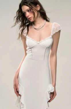 Ruffle Hem Sheer Sleeve Ruched Midi Dress With Flower Accent 18 Ruffle Hem Sheer Sleeve Ruched Midi Dress With Flower Accent -Modern Wear Shop 816c10dba179241096349e42ee76d4cf