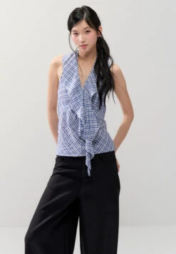 Sleeveless Checker Ruffle Front Tie Halter Top -Modern Wear Shop 8bf79b32666d50e1cea6036196f2ef90