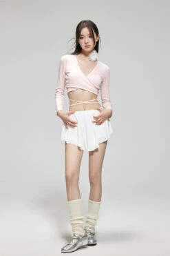 Wrap Long Sleeve Top And Skirted Bikini Set -Modern Wear Shop 9f40c4cc75bce871fca3311feac90e41