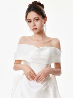 Off Shoulder Satin Gown With Draped Bodice And Bow Accents -Modern Wear Shop Bow Wedding Dress White 2583