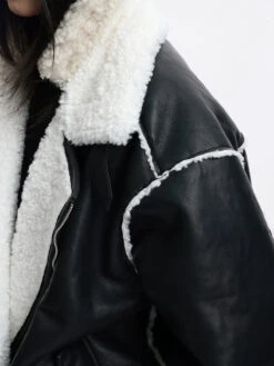 Oversized Faux Leather Jacket With Sherpa Lining And Trim -Modern Wear Shop a79748a275ee0fa554e64ff2fc225325