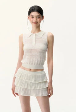 Sleeveless Knit Crop Polo Top And Tiered Mini Skirt Two-Piece Set -Modern Wear Shop a9544666367b87b668f2a0d92622bac9