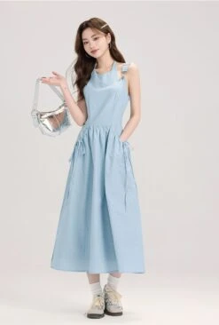 Sleeveless Midi Dress With Bow Tie Pockets 17 Sleeveless Midi Dress With Bow Tie Pockets -Modern Wear Shop ada76abdbe6b88e5725f9a10d597eced