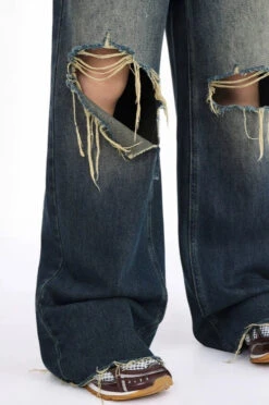 Distressed Wide-Leg Denim Jeans With Raw Hems -Modern Wear Shop b8e3e5e2deb32c12e1acfe7e7d7e930f