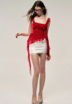 Asymmetric Hem Ruffled Sleeveless Top With Floral Accent -Modern Wear Shop c9d50102638bf9caf2ec8a66bcd98d32