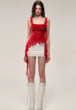 Asymmetric Hem Ruffled Sleeveless Top With Floral Accent -Modern Wear Shop d7568a060c293b9a393c3c8bdce6c82a