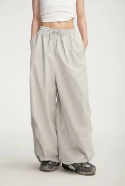 Drawstring Wide-Leg Parachute Jogger Pants 32 Drawstring Wide-Leg Parachute Jogger Pants -Modern Wear Shop dc76f48334b000ef4d81c7bd5c1ad465