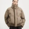 Puffer Jacket With Ribbed Hem And Zippered Pockets