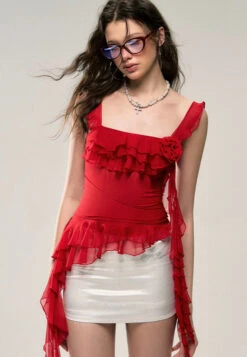 Asymmetric Hem Ruffled Sleeveless Top With Floral Accent -Modern Wear Shop fcbe4f7d72514771028d2790760394b8