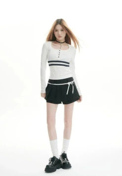 Pleated Tennis Mini Skirt With Bow-Knot Drawstring Waist -Modern Wear Shop fe6c27edf73dfd02e79a6163aface80e